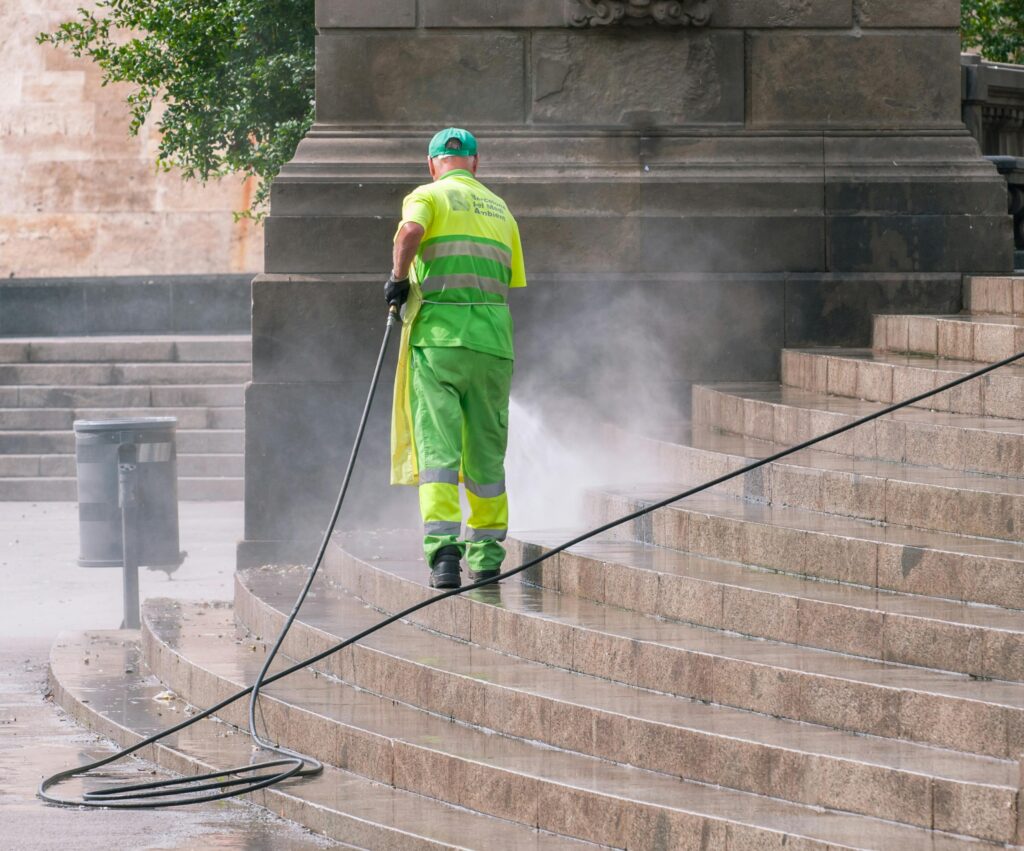 Cleaner cleaning the Staircase